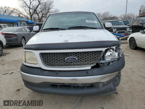 2001 Ford F-150 XL z VIN 1FTRX17W81NA56565, wystawiony jako Copart lot #45876055 z przebiegiem 241 522 mil mil oraz Szkoda całkowita • Salvage title. Historia ofert i sprzedaży dostępna na DreamBid. Obrazek 5.