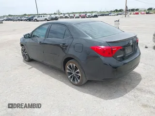 2017 Toyota Corolla L with VIN 2T1BURHE4HC843864, listed as a IAAI auction lot 42274808 with 106,371 mi miles and . Bid and sale history available at DreamBid. Image 3.