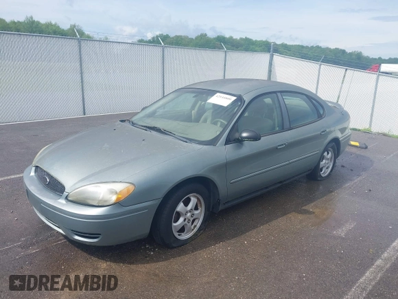 2005 Ford Taurus SE with VIN 1FAFP53U55A209369, listed as a IAAI auction lot 42144800 with 152,446 mi miles. Bid and sale history available at carsss.com. Image 2.