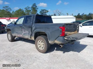 2024 Toyota Tacoma 4WD SR5 with VIN 3TYLB5JNXRT031852, listed as a IAAI auction lot 41779552 with 9,625 mi miles. Bid and sale history available at carsss.com. Image 3.