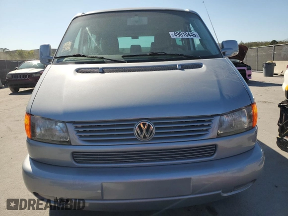 2002 Volkswagen EuroVan с VIN WV2KB47012H065431, выставлен на аукционе Copart как лот 49010445 с пробегом 78 985 миль миль и Чистый • Clean title. История ставок и продаж доступна на DreamBid. Изображение 5.