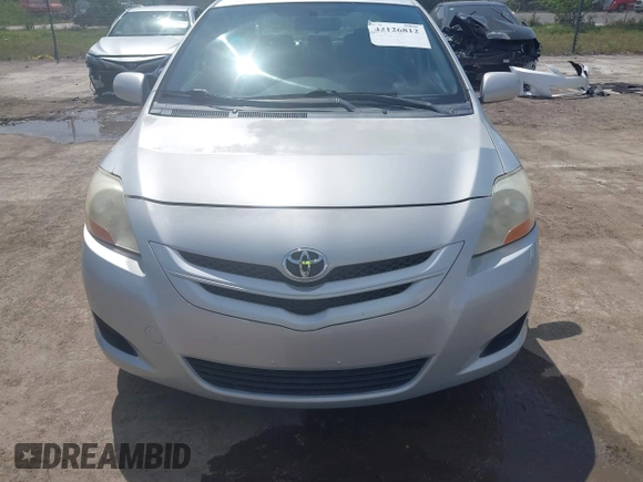 2007 Toyota Yaris with VIN JTDBT923871051021, listed as a IAAI auction lot 42126812 with 316,556 mi miles. Bid and sale history available at carsss.com. Image 6.