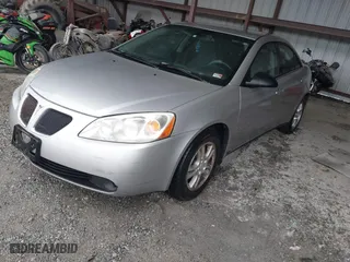 2006 Pontiac G6 6-Cyl with VIN 1G2ZG578364212411, listed as a IAAI auction lot 41978085 with 226,338 mi miles. Bid and sale history available at carsss.com. Image 2.