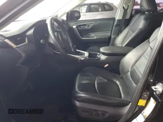 2019 Toyota RAV4 XLE Premium with VIN JTMA1RFV5KD026145, listed as a Copart auction lot 48238125 with 101,443 mi miles and Salvage Title. Bid and sale history available at carsss.com. Image 7.