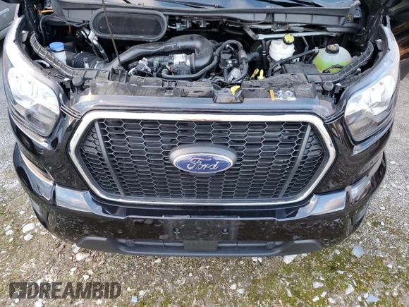 2023 Ford Transit with VIN 1FBVU4X8XPKB63870, listed as a Copart auction lot 82731504 with 7,576 mi miles and Salvage Title. Bid and sale history available at DreamBid. Image 12.