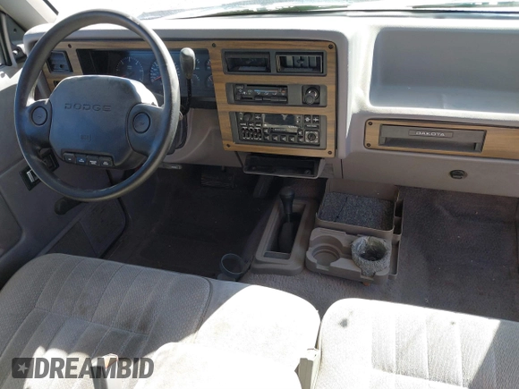 1994 Dodge Dakota z VIN 1B7GG23Y4RS589157, wystawiony jako IAAI lot #41869916 z przebiegiem 122 140 mil mil oraz . Historia ofert i sprzedaży dostępna na DreamBid. Obrazek 17.