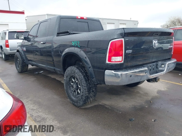 2015 Ram 2500 Laramie with VIN 3C6UR5NL2FG614941, listed as a IAAI auction lot 41785882 with 155,061 mi miles and . Bid and sale history available at DreamBid. Image 3.
