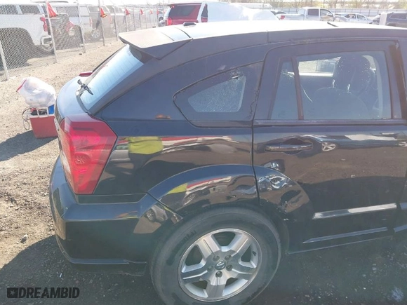 2011 Dodge Caliber Mainstreet with VIN 1B3CB3HA8BD192559, listed as a IAAI auction lot 41855432 with 253,003 mi miles. Bid and sale history available at carsss.com. Image 20.