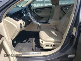 2014 Ford Taurus Limited with VIN 1FAHP2F84EG149622, listed as a Copart auction lot 63764675 with 208,801 mi miles and Salvage title. Bid and sale history available at DreamBid. Image 7.