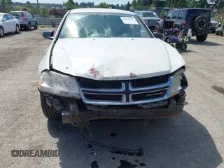 2014 Dodge Avenger SE with VIN 1C3CDZAB0EN219318, listed as a IAAI auction lot 42479311 with 209,224 mi miles and . Bid and sale history available at DreamBid. Image 6.