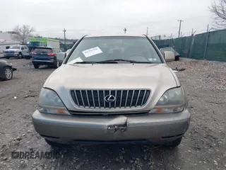1999 Lexus RX 300 Luxury SUV with VIN JT6HF10U7X0090467, listed as a IAAI auction lot 41792768 with 263,408 mi miles. Bid and sale history available at carsss.com. Image 11.
