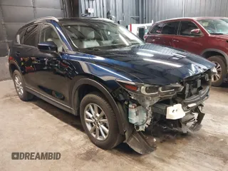 2023 Mazda CX-5 2.5 S Carbon Edition with VIN JM3KFBCM2P0109675, listed as a IAAI auction lot 41664735 with 30,139 mi miles. Bid and sale history available at carsss.com. Image 1.