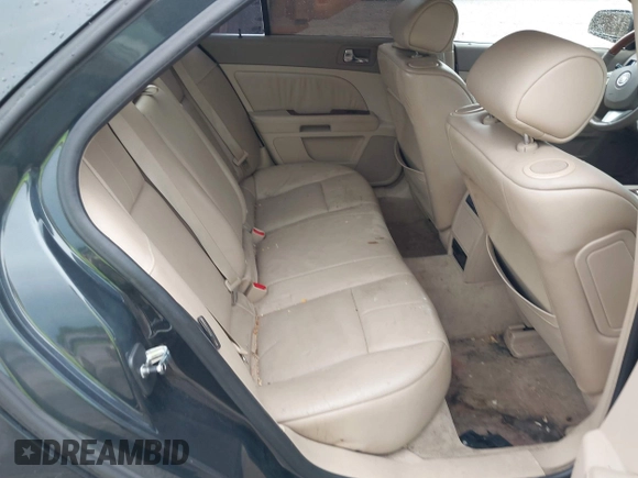 2008 Cadillac STS RWD with VIN 1G6DK67V980165768, listed as a IAAI auction lot 42185454 with 214,813 mi miles and . Bid and sale history available at DreamBid. Image 8.