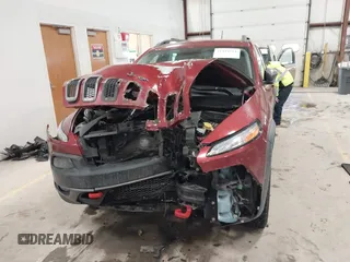 2015 Jeep Cherokee Trailhawk with VIN 1C4PJMBS7FW646577, listed as a IAAI auction lot 41404911 with 85,343 mi miles and . Bid and sale history available at DreamBid. Image 12.