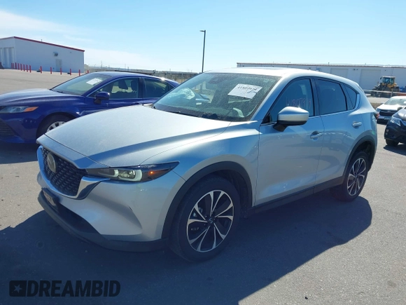 2023 Mazda CX-5 2.5 S Premium Package with VIN JM3KFBDM9P0173453, listed as a IAAI auction lot 41807979 with 34,156 mi miles. Bid and sale history available at carsss.com. Image 17.