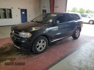 2013 Dodge Durango SXT with VIN 1C4RDJAGXDC559380, listed as a Copart auction lot 63001645 with 200,807 mi miles and Salvage title. Bid and sale history available at DreamBid. Image 1.