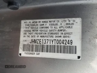 2000 Honda Insight z VIN JHMZE1371YT004249, wystawiony jako Copart lot #85041024 z przebiegiem 168 946 mil mil oraz Szkoda całkowita • Salvage title. Historia ofert i sprzedaży dostępna na DreamBid. Obrazek 14.
