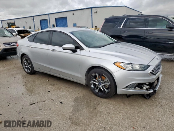 2017 Ford Fusion SE with VIN 3FA6P0HDXHR170848, listed as a Copart auction lot 54949075 with 156,218 mi miles and Salvage title. Bid and sale history available at DreamBid. Image 4.