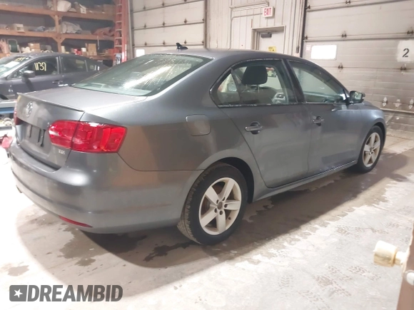 2011 Volkswagen Jetta TDI with VIN 3VWLL7AJ4BM086978, listed as a IAAI auction lot 41981137 with 171,191 mi miles and . Bid and sale history available at DreamBid. Image 4.