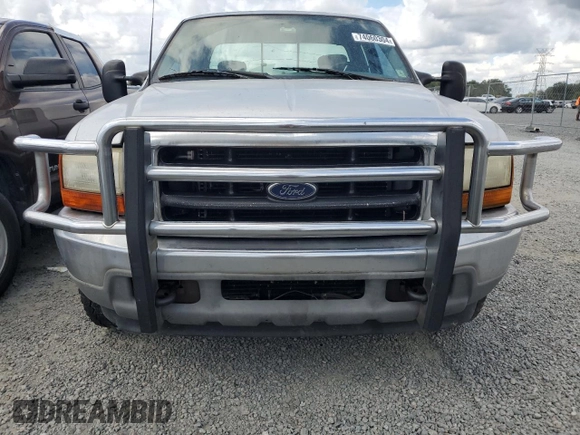 2001 Ford Super Duty F-250 XL with VIN 1FTNX20F61EB23095, listed as a Copart auction lot 74060304 with 458,656 mi miles and Salvage Title. Bid and sale history available at carsss.com. Image 5.