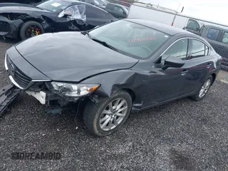 2016 Mazda 6 i Sport with VIN JM1GJ1U55G1472416, listed as a IAAI auction lot 41961622 with 157,315 mi miles and . Bid and sale history available at DreamBid. Image 2.