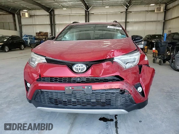 2016 Toyota RAV4 SE with VIN 2T3JFREVXGW458596, listed as a Copart auction lot 51746075 with 99,277 mi miles and Salvage title. Bid and sale history available at DreamBid. Image 12.