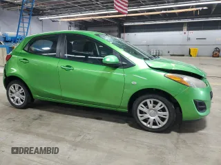 2012 Mazda 2 Sport with VIN JM1DE1KY9C0151578, listed as a Copart auction lot 52625055 with 123,812 mi miles and Salvage Title. Bid and sale history available at DreamBid. Image 4.