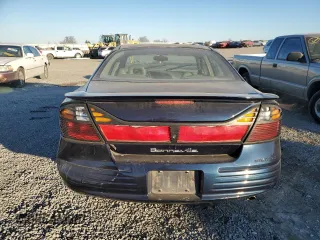 2002 Pontiac Bonneville SE z VIN 1G2HX54K724163736, wystawiony jako Copart lot #42327205 z przebiegiem Nie podano mil oraz Szkoda całkowita • Salvage title. Historia ofert i sprzedaży dostępna na DreamBid. Obrazek 6.