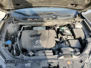 2014 Mazda CX-5 Grand Touring with VIN JM3KE4DY5E0372787, listed as a Copart auction lot 48873675 with 136,784 mi miles and Salvage Title. Bid and sale history available at carsss.com. Image 12.