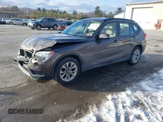 2014 BMW X1 xDrive28i with VIN WBAVL1C56EVY19340, listed as a IAAI auction lot 41340436 with 85,867 mi miles. Bid and sale history available at carsss.com. Image 17.