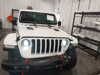 2022 Jeep Wrangler Unlimited Rubicon z VIN 1C4HJXFG7NW106446, wystawiony jako IAAI lot #41405202 z przebiegiem 39 755 mil mil oraz . Historia ofert i sprzedaży dostępna na DreamBid. Obrazek 12.