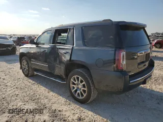 2019 GMC Yukon Denali with VIN 1GKS1CKJ9KR134571, listed as a Copart auction lot 73275664 with 50,853 mi miles and Salvage Title. Bid and sale history available at carsss.com. Image 2.