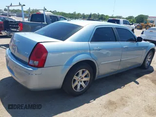 2006 Chrysler 300 Touring with VIN 2C3KA53G56H324954, listed as a IAAI auction lot 42058478 with 124,933 mi miles. Bid and sale history available at carsss.com. Image 4.
