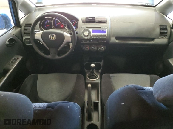 2007 Honda Fit with VIN JHMGD37497S058490, listed as a Copart auction lot 52173575 with 177,145 mi miles and Salvage Title. Bid and sale history available at carsss.com. Image 8.