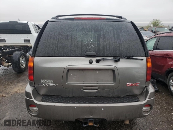 2006 GMC Envoy SLT with VIN 1GKDT13S262141598, listed as a Copart auction lot 45374304 with 258,039 mi miles and Salvage Title. Bid and sale history available at carsss.com. Image 6.