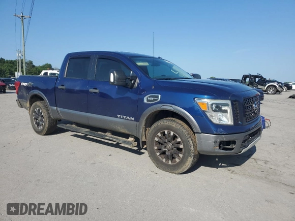 2017 Nissan Titan Pro-4X with VIN 1N6AA1E5XHN544948, listed as a Copart auction lot 61851175 with 216,797 mi miles and Clean title. Bid and sale history available at DreamBid. Image 4.