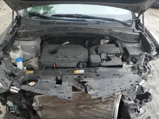 2017 Hyundai Santa Fe 2.4L z VIN 5NMZU3LB8HH032409, wystawiony jako Copart lot #57939915 z przebiegiem 105 494 mil mil oraz Szkoda całkowita • Salvage title. Historia ofert i sprzedaży dostępna na DreamBid. Obrazek 11.