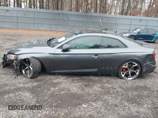 2023 Audi RS 5 z VIN WUANWAF55PA902356, wystawiony jako IAAI lot #41034121 z przebiegiem 3 717 mil mil oraz . Historia ofert i sprzedaży dostępna na DreamBid. Obrazek 13.