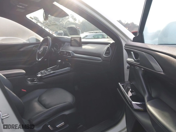 2016 Mazda CX-9 Grand Touring with VIN JM3TCBDY3G0116309, listed as a IAAI auction lot 40890199 with 64,948 mi miles. Bid and sale history available at carsss.com. Image 5.
