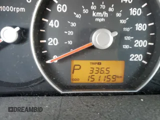 2009 Kia Rondo LX Base with VIN KNAFG528597268730, listed as a Copart auction lot 77071064 with 151,159 mi miles and Salvage Title. Bid and sale history available at carsss.com. Image 9.