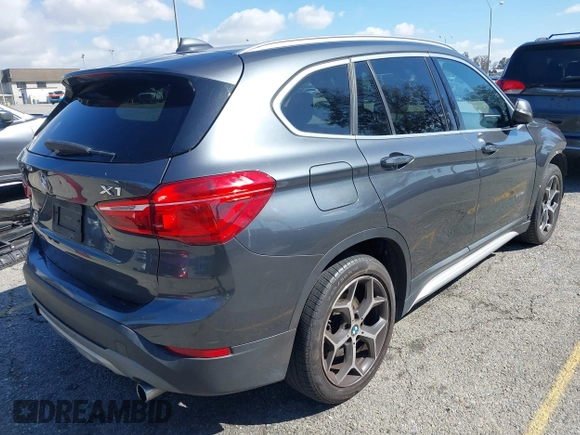 2018 BMW X1 sDrive28i with VIN WBXHU7C36J5L05628, listed as a IAAI auction lot 41708522 with 91,352 mi miles and . Bid and sale history available at DreamBid. Image 4.