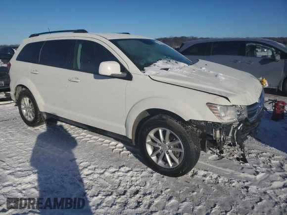 2014 Dodge Journey SXT with VIN 3C4PDCBGXET149847, listed as a Copart auction lot 45884035 with 131,121 mi miles and Salvage Title. Bid and sale history available at carsss.com. Image 4.