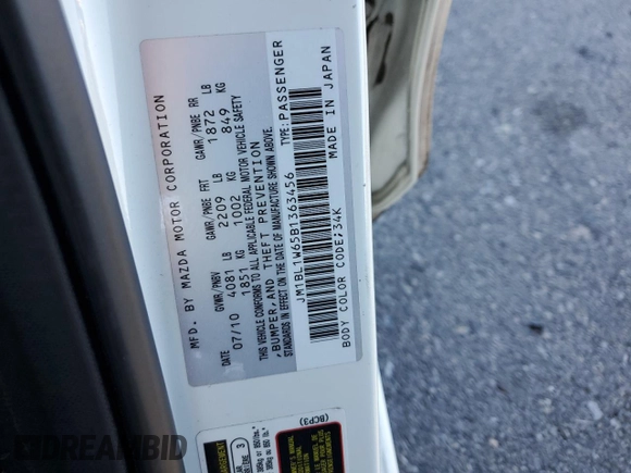 2011 Mazda 3 S Grand Touring with VIN JM1BL1W65B1363456, listed as a Copart auction lot 77378364 with 106,669 mi miles and Salvage Title. Bid and sale history available at DreamBid. Image 12.