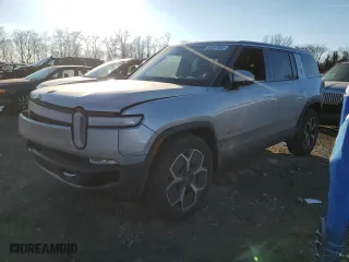 2023 Rivian R1S Adventure with VIN 7PDSGABAXPN008547, listed as a Copart auction lot 89061955 with 24,454 mi miles and Salvage Title. Bid and sale history available at carsss.com. Image 1.