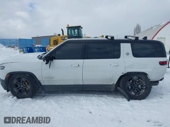 2023 Rivian R1S Adventure z VIN 7PDSGABA9PN015327, wystawiony jako IAAI lot #41484133 z przebiegiem Nie podano mil oraz . Historia ofert i sprzedaży dostępna na DreamBid. Obrazek 15.