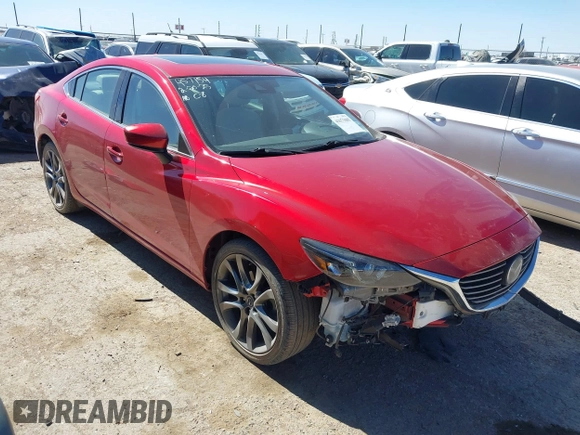 2017 Mazda 6 Grand Touring with VIN JM1GL1W52H1139776, listed as a IAAI auction lot 41671005 with 40,884 mi miles and . Bid and sale history available at DreamBid. Image 1.