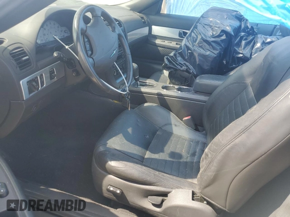 2002 Ford Thunderbird Hardtop Premium z VIN 1FAHP60A52Y115214, wystawiony jako Copart lot #70801894 z przebiegiem Nie podano mil oraz Szkoda całkowita • Salvage title. Historia ofert i sprzedaży dostępna na DreamBid. Obrazek 7.