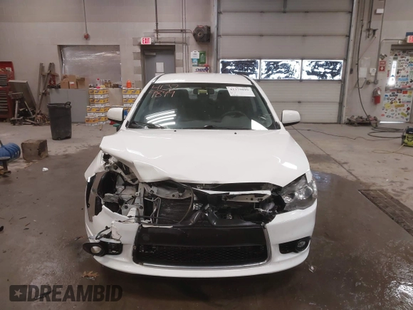 2014 Mitsubishi Lancer GT with VIN JA32U8FWXEU016230, listed as a IAAI auction lot 41379899 with 108,511 mi miles. Bid and sale history available at carsss.com. Image 12.