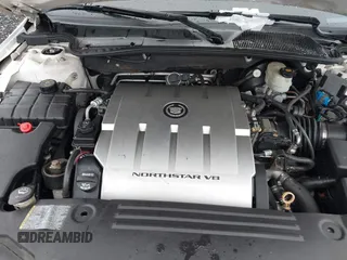 2010 Cadillac DTS 1SD z VIN 1G6KH5EYXAU121435, wystawiony jako IAAI lot #42175287 z przebiegiem Nie podano mil oraz . Historia ofert i sprzedaży dostępna na DreamBid. Obrazek 10.