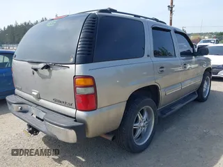 2001 Chevrolet Tahoe LS with VIN 1GNEK13T41J278818, listed as a IAAI auction lot 42125186 with 243,319 mi miles. Bid and sale history available at carsss.com. Image 4.